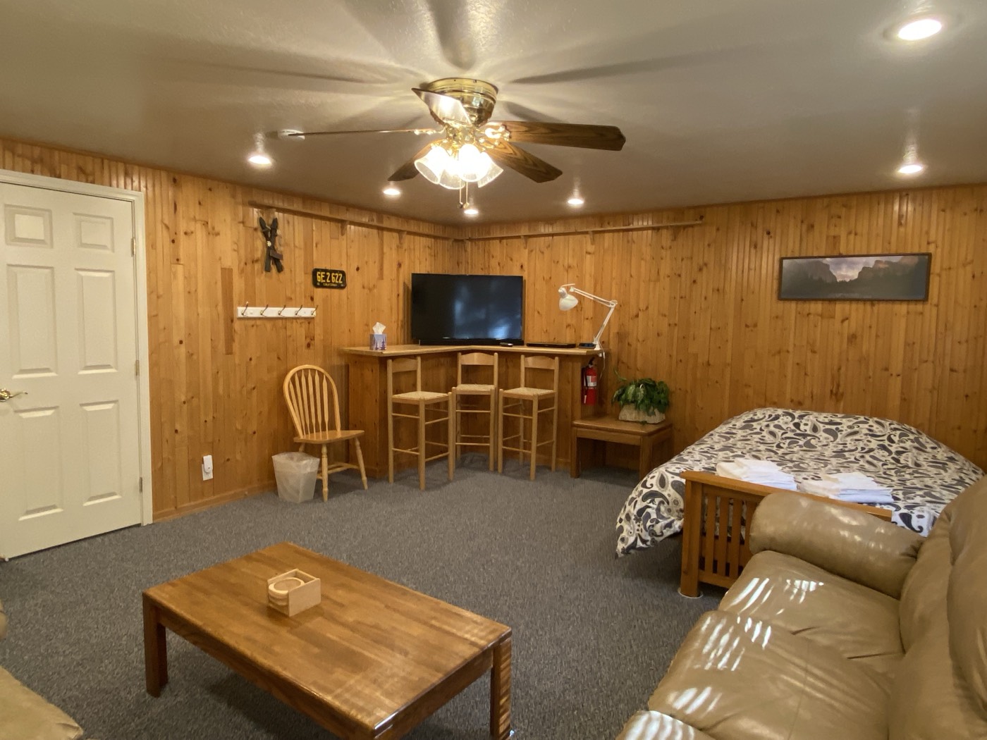 Queen futon upstairs, bar, stools, and seating